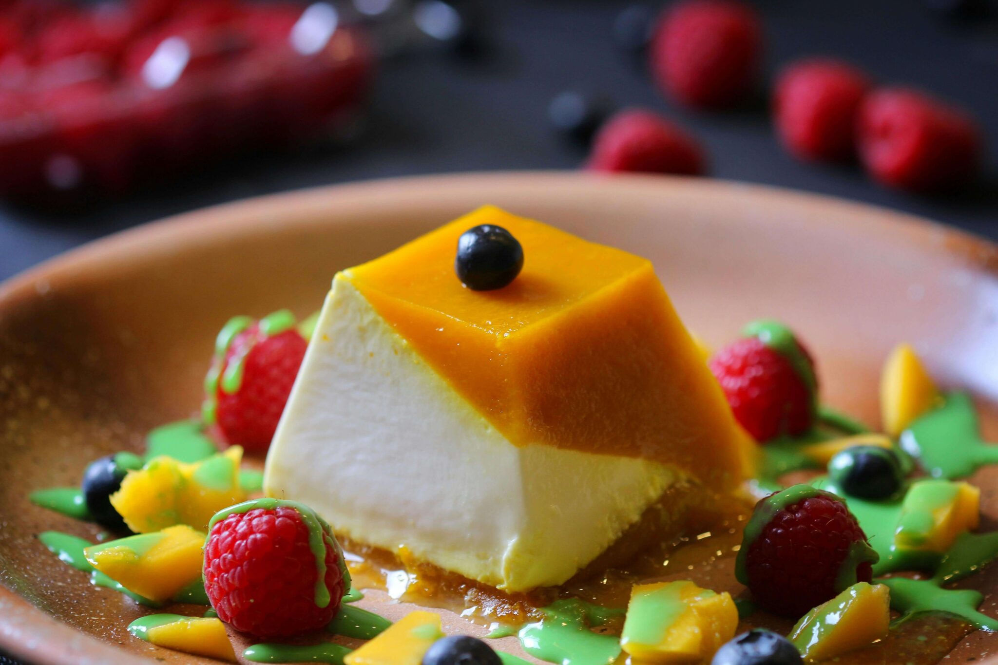 Panna cotta dessert with caramel and fruits