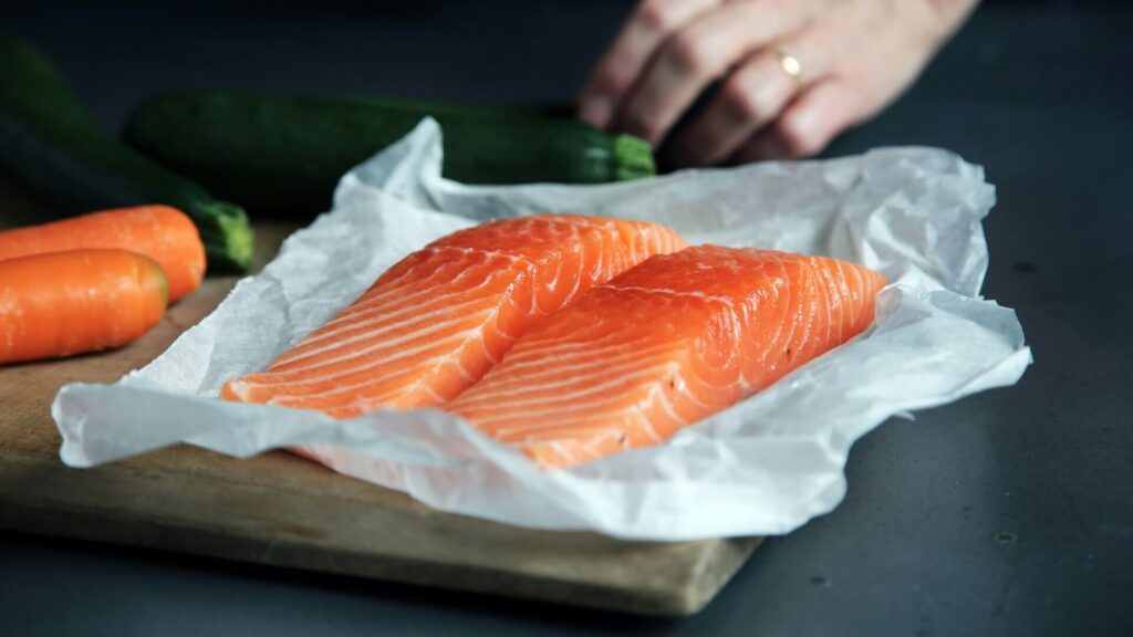 Salmon steaks being prepared for dinner.