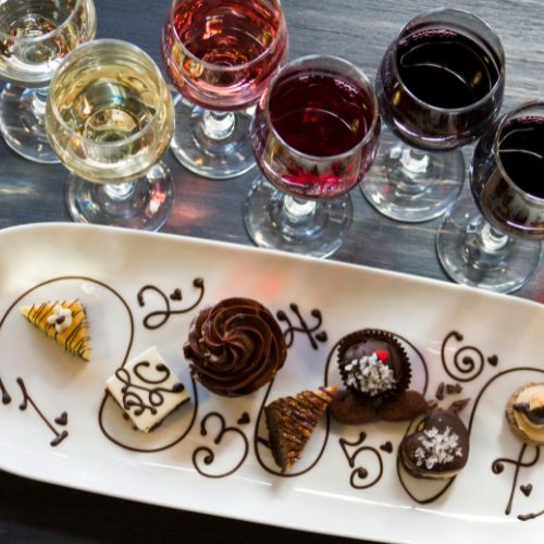 Glasses with wine samples paired with desserts
